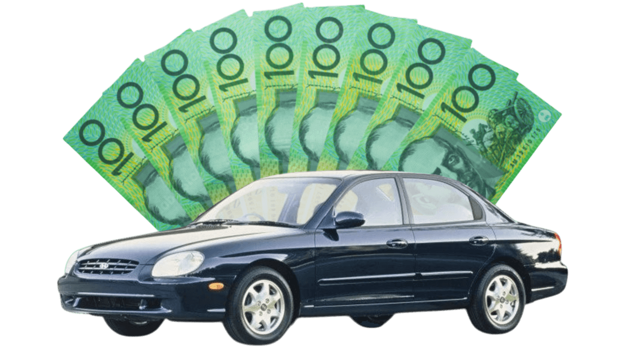 Photo of an old car with a lot of cash behind it